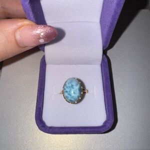 Larimar stone on 925 silver setting

Adjustable
